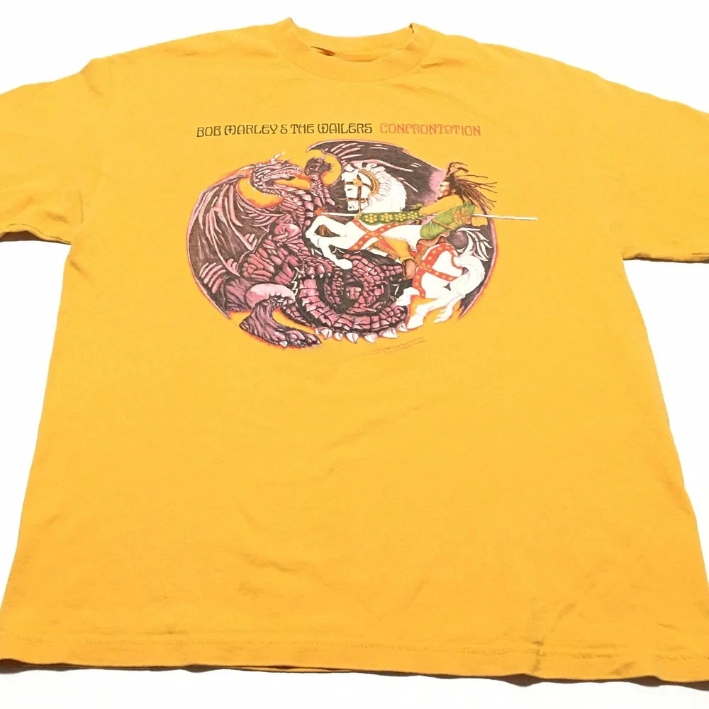 Новая модель 2025 года BOB MARLEY & The WAILERS Confrontation Zion Rootswear, винтажная футболка, винтажные летние повседневные футболки streetw
Новая модель 2025 года BOB MARLEY & The WAILERS Confrontation Zion Rootswear, винтажная футболка, винтажные летние повседневные футболки streetw