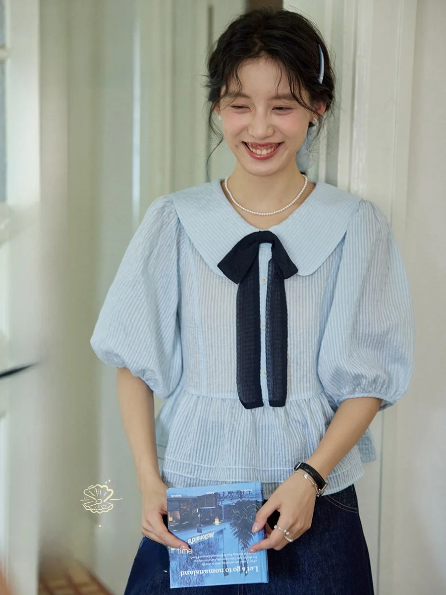 Женская дышащая хлопковая винтажная повседневная блузка Nov Et с воротником-куклой и съемными короткими рукавами, синяя
Женская дышащая хлопковая винтажная повседневная блузка Nov Et с воротником-куклой и съемными короткими рукавами, синяя