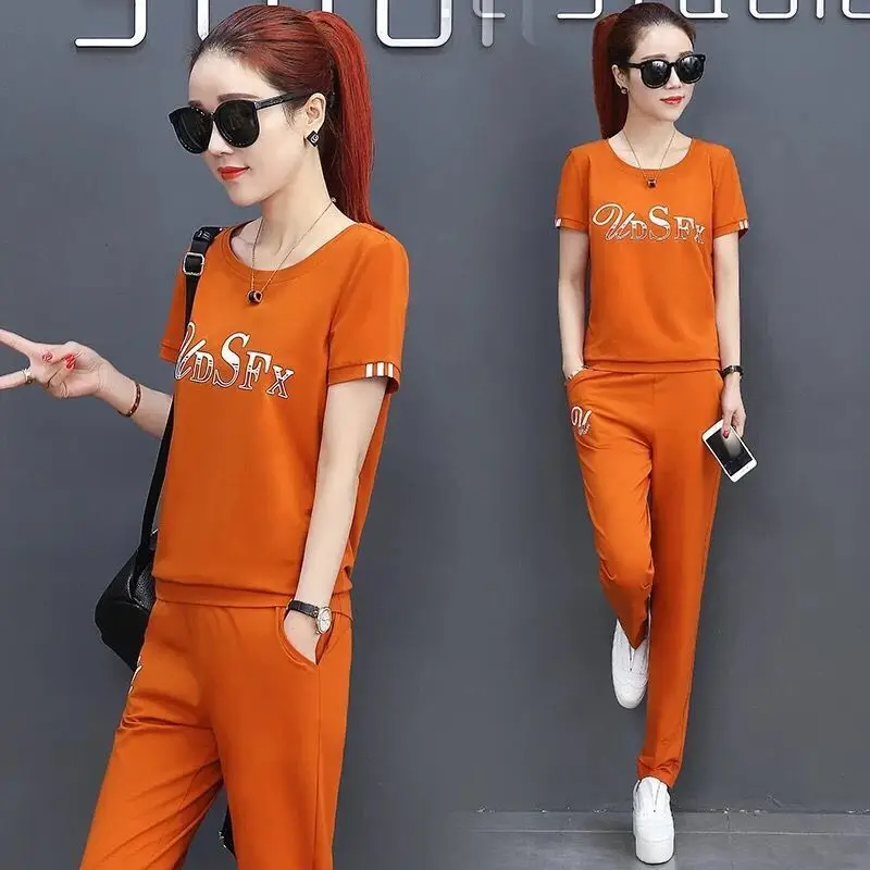 Women's Korean Sports Suit 2024 Spring Summer New Loose Short Sleeve Tops And Pant Two Piece Sets Student Casual Running Outfits
Women's Korean Sports Suit 2024 Spring Summer New Loose Short Sleeve Tops And Pant Two Piece Sets Student Casual Running Outfits