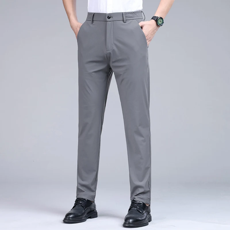 Мужские летние прямые эластичные брюки из ледяного шелка, офисные облегающие брюки, однотонные прямые брюки, деловые повседневные брюки до щиколотки
Мужские летние прямые эластичные брюки из ледяного шелка, офисные облегающие брюки, однотонные прямые брюки, деловые повседневные брюки до щиколотки