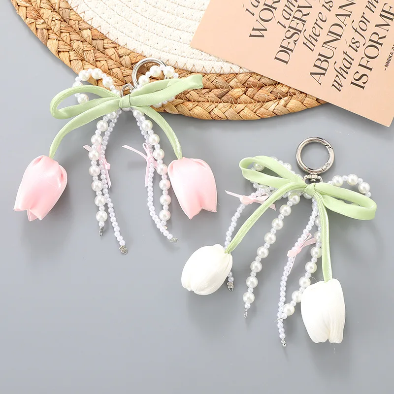 New Sweet Tulip Bag Decorative Pendant Pearl Bow Phone Case Hanging Chain Earphone Case Hanging Decoration Wholesale
New Sweet Tulip Bag Decorative Pendant Pearl Bow Phone Case Hanging Chain Earphone Case Hanging Decoration Wholesale