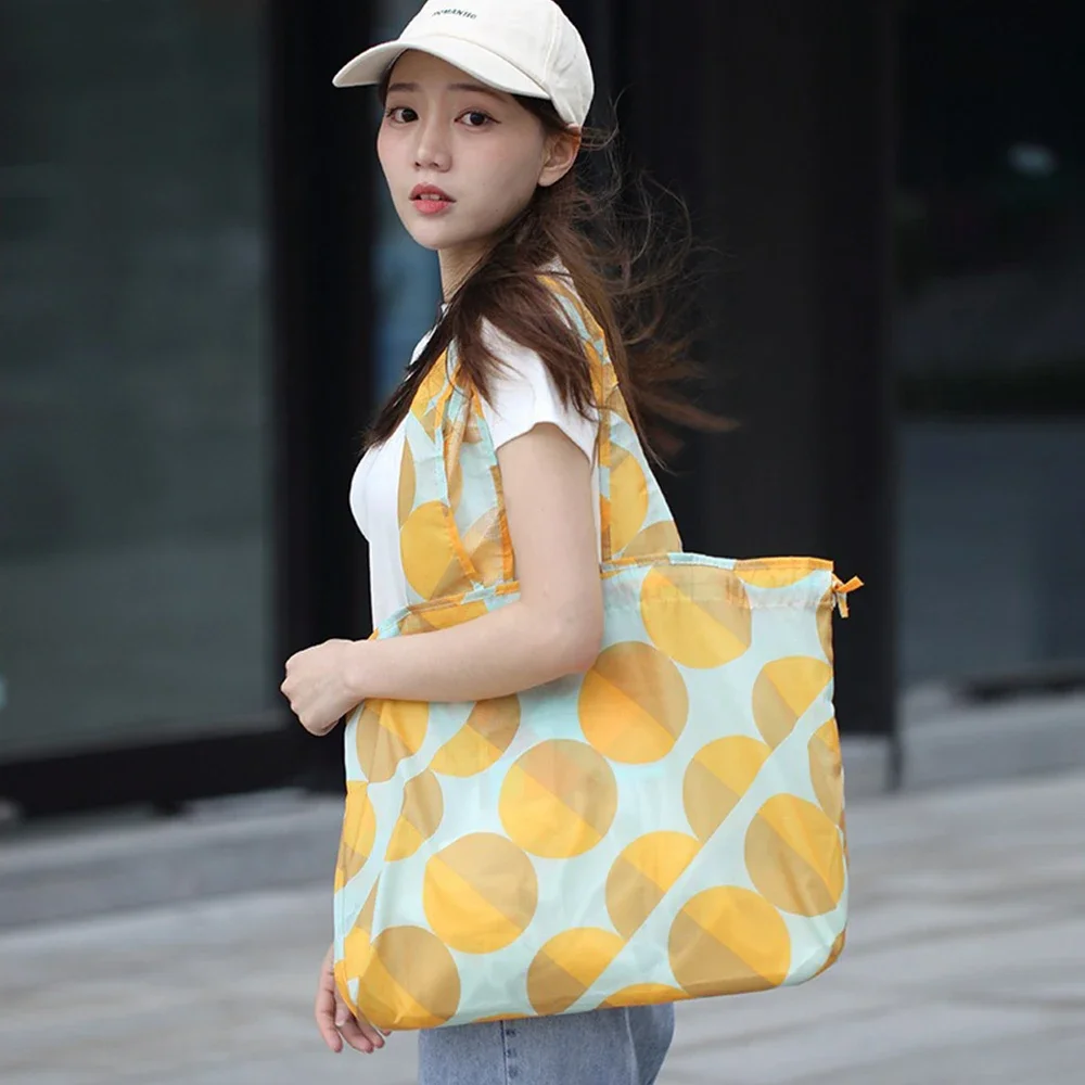 Storage bag Nylon Shoulder bag Foldable Large Capacity Casual Shopping durable Portable reusable bags Drawstring supermarket bag
Storage bag Nylon Shoulder bag Foldable Large Capacity Casual Shopping durable Portable reusable bags Drawstring supermarket bag