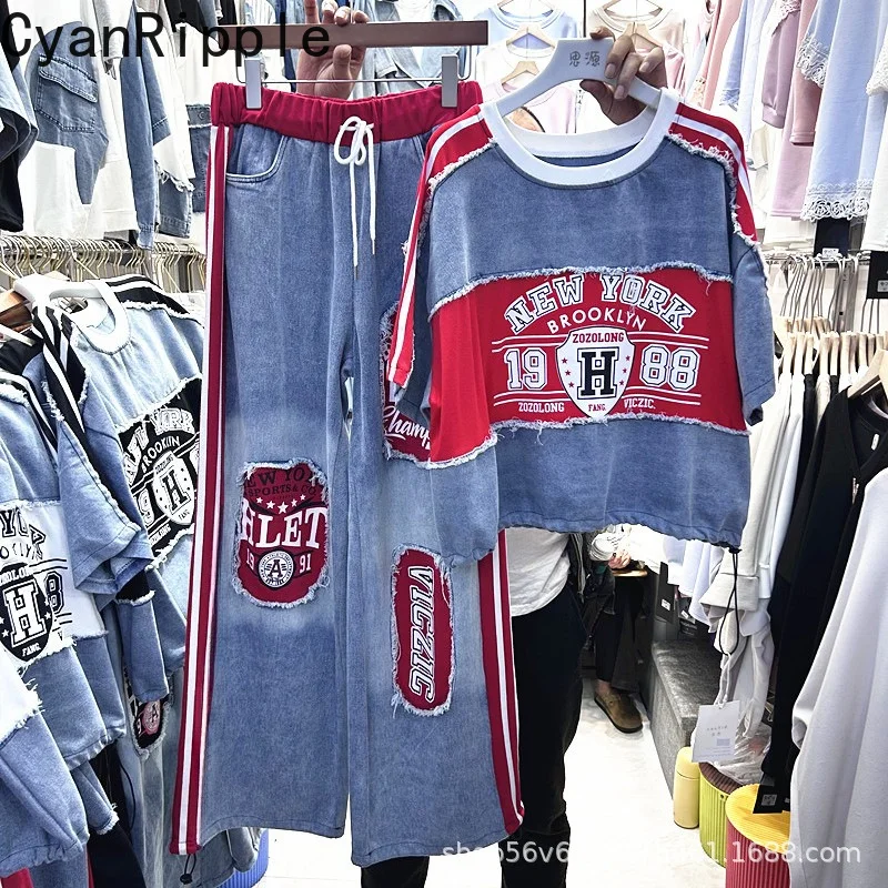 Fashionable Women Two-piece Sets Denim Splicing Letters Printed Loose Short Sleeve T-shirt Top+Elastic High Waist Straight Jeans
Fashionable Women Two-piece Sets Denim Splicing Letters Printed Loose Short Sleeve T-shirt Top+Elastic High Waist Straight Jeans