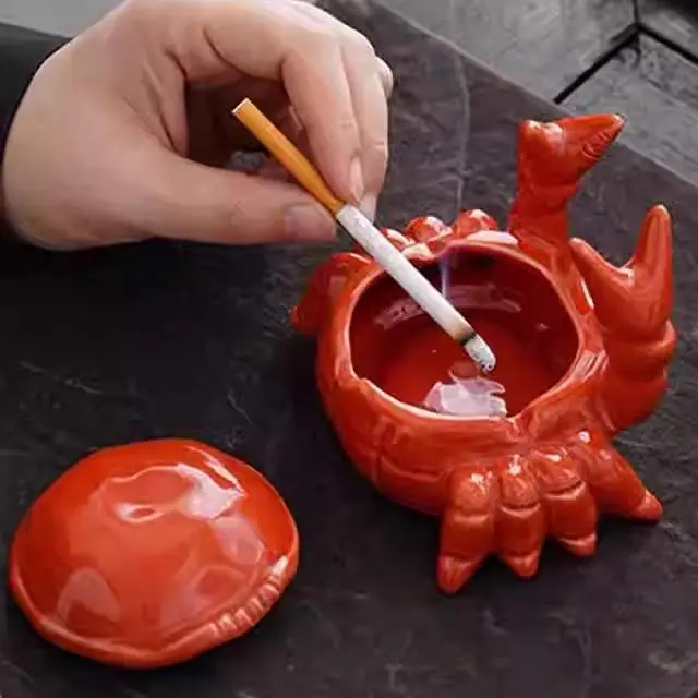 Crab ceramic ashtray small tea pet office home living room with cover anti-fly ash Chinese cute ornament decoration
Crab ceramic ashtray small tea pet office home living room with cover anti-fly ash Chinese cute ornament decoration