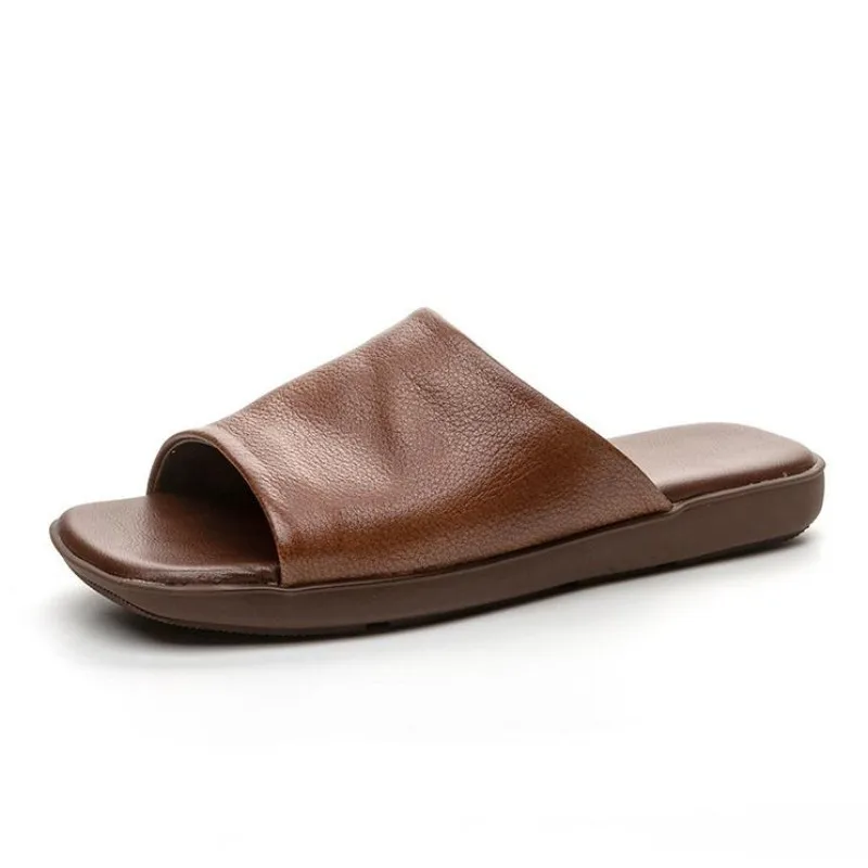 Женские тапочки из натуральной кожи, летние повседневные шлепанцы без шнуровки с открытым носком, мягкая подошва, черные женские тапочки на плоской подошве в стиле ретро
Женские тапочки из натуральной кожи, летние повседневные шлепанцы без шнуровки с открытым носком, мягкая подошва, черные женские тапочки на плоской подошве в стиле ретро