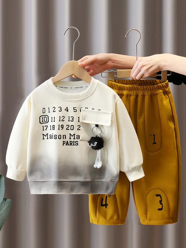New Cartoon Doll Pendant Tracksuit Boy Letter Printed Sweatshirts and Pants 2pcs Suit Children Outfit Girl Casual Sets 2-11Yrs
New Cartoon Doll Pendant Tracksuit Boy Letter Printed Sweatshirts and Pants 2pcs Suit Children Outfit Girl Casual Sets 2-11Yrs