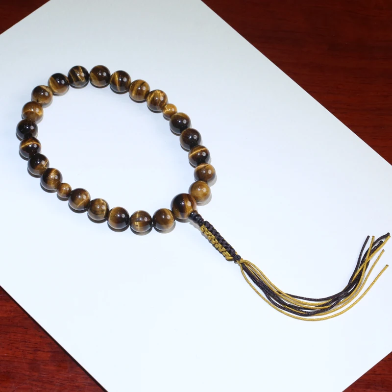 Natural Tiger Eye Stone Bracelet 12mm Handheld Prayer Beads with Handwoven Tassel, Energy Healing, Unisex"
Natural Tiger Eye Stone Bracelet 12mm Handheld Prayer Beads with Handwoven Tassel, Energy Healing, Unisex"