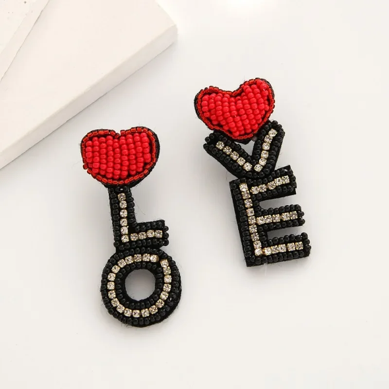 2025 Handmade Bead Earrings Heart Letters LOVE Originality Design Hand Knitting Bohemia Beaded Earrings For Women
2025 Handmade Bead Earrings Heart Letters LOVE Originality Design Hand Knitting Bohemia Beaded Earrings For Women