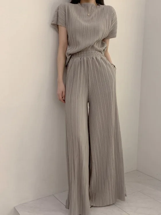 Women's Pleated T-Shirt Top round Neck Loose Slimming Drapey Airy Wide Leg Pants Set Fashionable Cotton Spring Collection
Women's Pleated T-Shirt Top round Neck Loose Slimming Drapey Airy Wide Leg Pants Set Fashionable Cotton Spring Collection