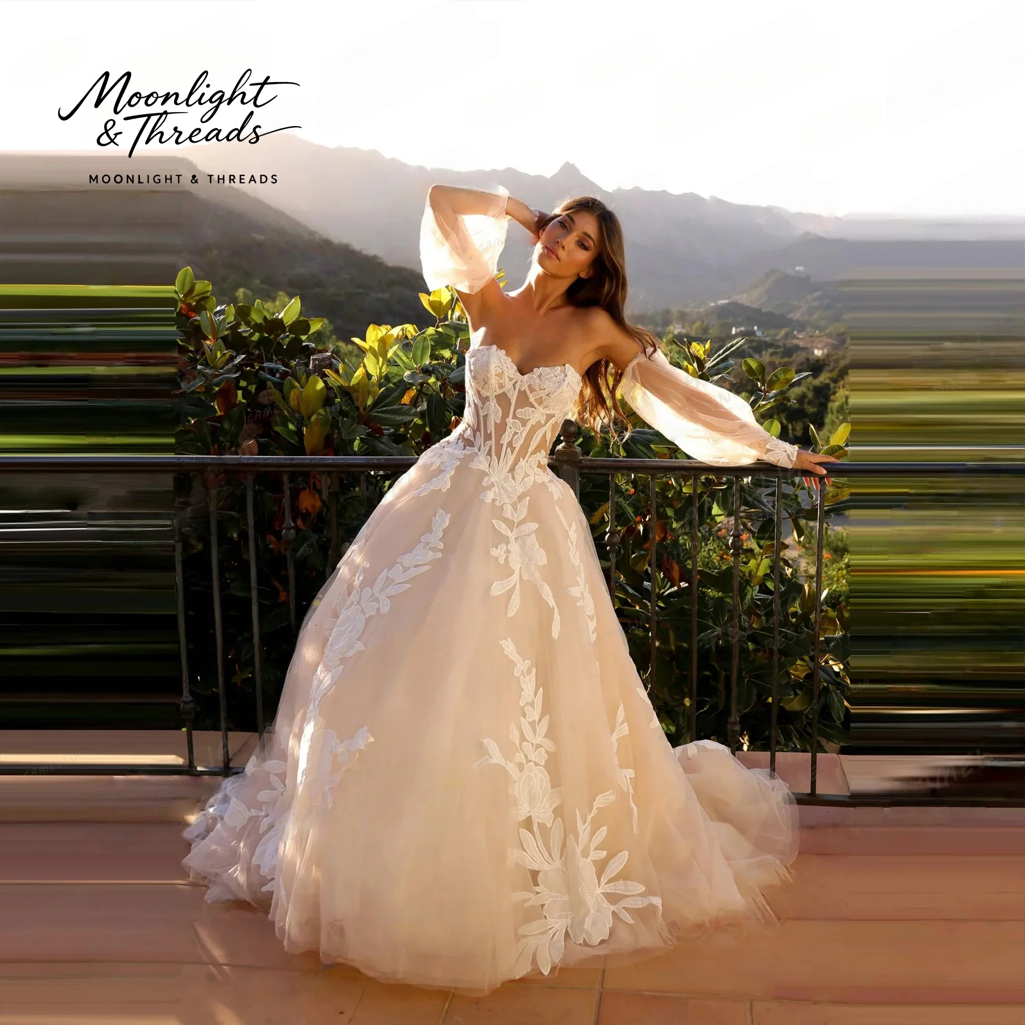 White off-the-shoulder long-sleeved full-skirted formal gown featuring a boned bodice and embroidery perfect for weddings
White off-the-shoulder long-sleeved full-skirted formal gown featuring a boned bodice and embroidery perfect for weddings