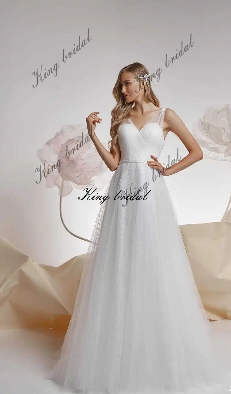 Custom Glitter Dotted Tulle Wedding Dress Sparkly Tulle Wedding Dresses Elegant Corset Bridal Gowns Draped Custom Bridal gown
Custom Glitter Dotted Tulle Wedding Dress Sparkly Tulle Wedding Dresses Elegant Corset Bridal Gowns Draped Custom Bridal gown