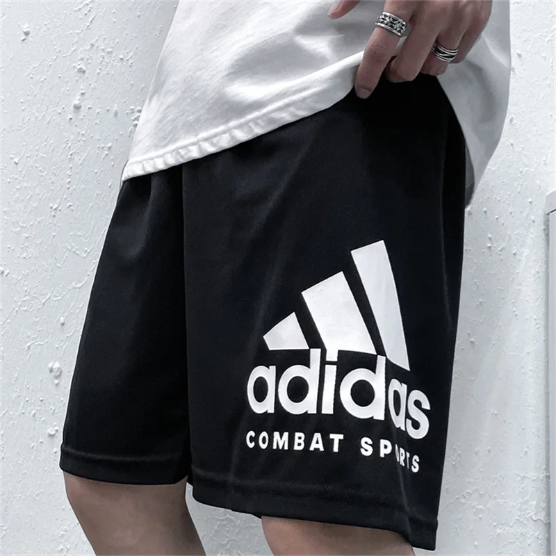 Брюки Adidas Мужские свободные быстросохнущие влагопоглощающие шорты с большим узором и логотипом Укороченные брюки черного цвета
Брюки Adidas Мужские свободные быстросохнущие влагопоглощающие шорты с большим узором и логотипом Укороченные брюки черного цвета