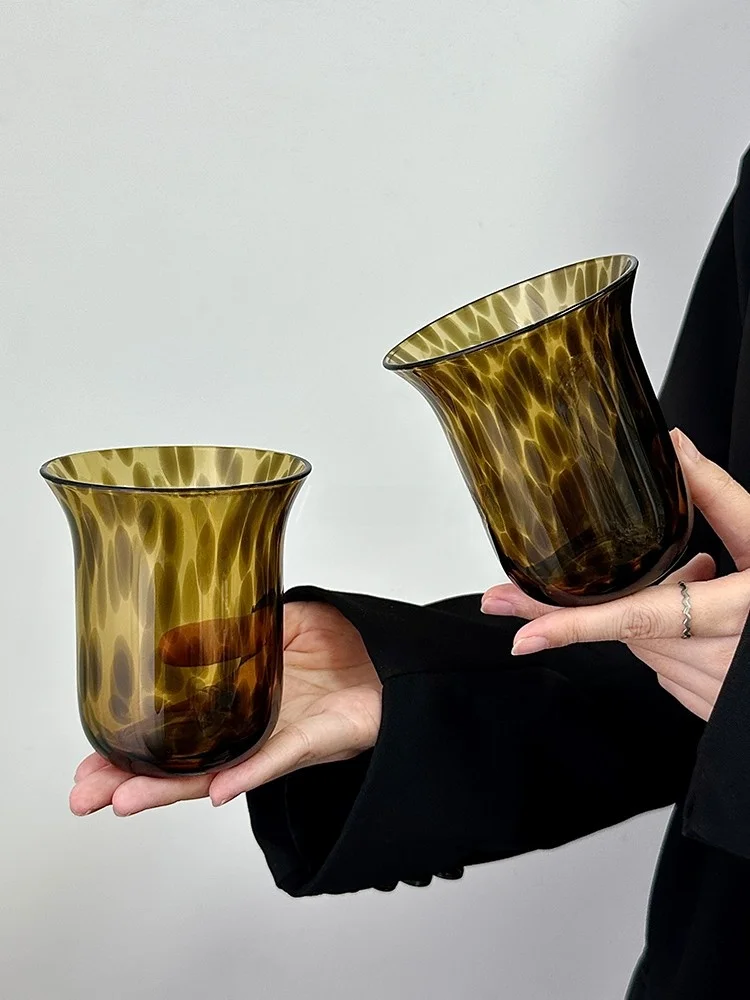 Creative Leopard Print Tea Colored Reversed Mouth Glass Cup High Aesthetic Value Juice Cup Cold Drink Cup Coffee Cup Home Use...
Creative Leopard Print Tea Colored Reversed Mouth Glass Cup High Aesthetic Value Juice Cup Cold Drink Cup Coffee Cup Home Use...