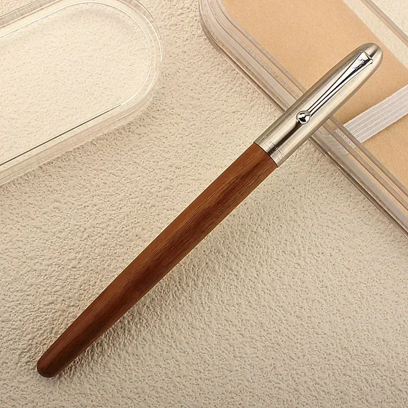 Перьевая ручка Jinhao 51, деревянное перо ручной работы, 0,38 мм, серебристый зажим, чернильная ручка, стационарные деловые офисные подарки, школьные принадлежности
Перьевая ручка Jinhao 51, деревянное перо ручной работы, 0,38 мм, серебристый зажим, чернильная ручка, стационарные деловые офисные подарки, школьные принадлежности