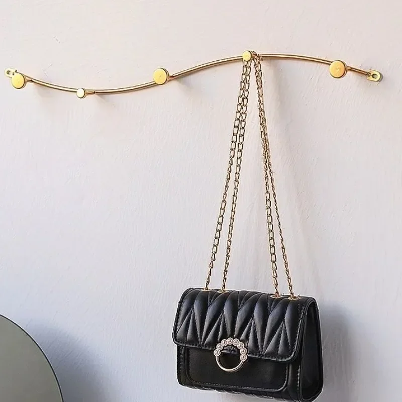 Железная аэрозольная краска, простая настенная вешалка для одежды, роскошная современная креативная настенная вешалка для входной двери, мебель для гостиной 
Железная аэрозольная краска, простая настенная вешалка для одежды, роскошная современная креативная настенная вешалка для входной двери, мебель для гостиной