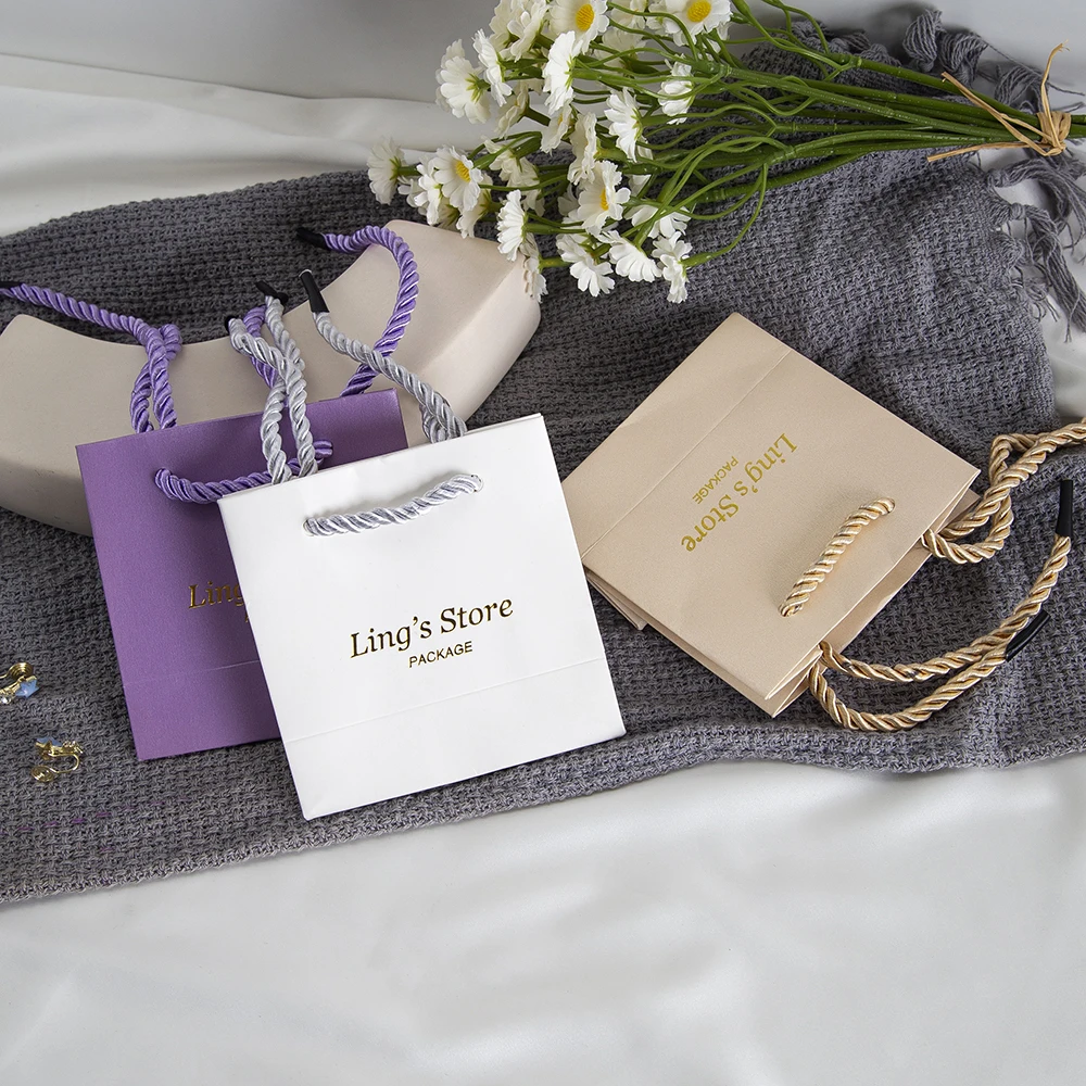 20/50/100Pcs Custom Logo Jewelry Paper Handle Bag Small Gift Packaging Tote Handbag Cosmetic Wig Perfume Scarf Organizer Pouches
20/50/100Pcs Custom Logo Jewelry Paper Handle Bag Small Gift Packaging Tote Handbag Cosmetic Wig Perfume Scarf Organizer Pouches