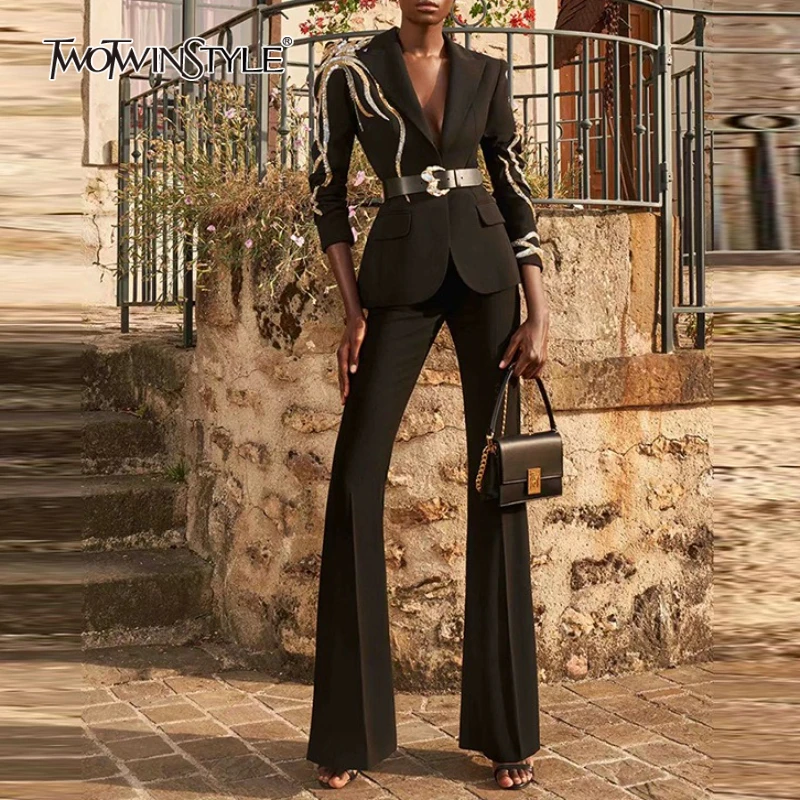 TWOTWINSTYLE Solid Slimming Two Piece Sets for Women Lapel Long Sleeves Patchwork Hot Fix Top High Waist Flared Pant Set Female 
TWOTWINSTYLE Solid Slimming Two Piece Sets for Women Lapel Long Sleeves Patchwork Hot Fix Top High Waist Flared Pant Set Female