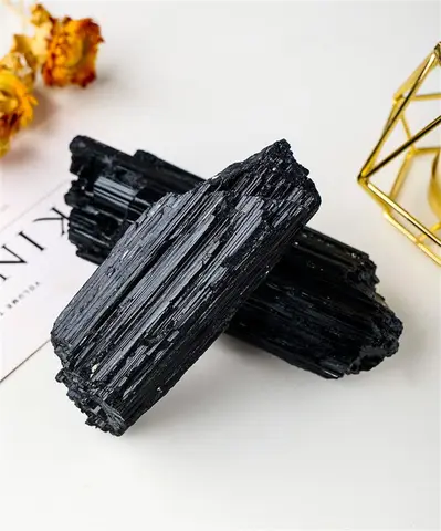 Natural crystal black tourmaline raw stone column Tomalin column aromatherapy stone raw stone mine logo