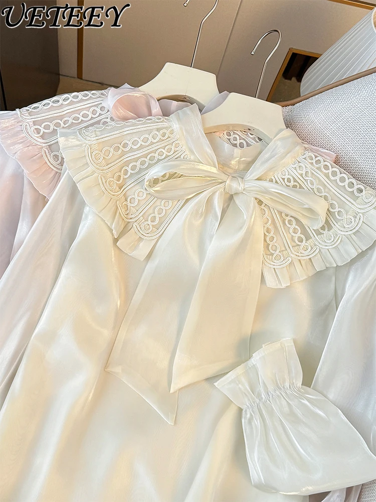 French Sweet Heavy Industry Doll Collar Bow Tie-up Shirt Women's Autumn Design Sense Loose Blouse Versatile Horn Sleeve Top
French Sweet Heavy Industry Doll Collar Bow Tie-up Shirt Women's Autumn Design Sense Loose Blouse Versatile Horn Sleeve Top