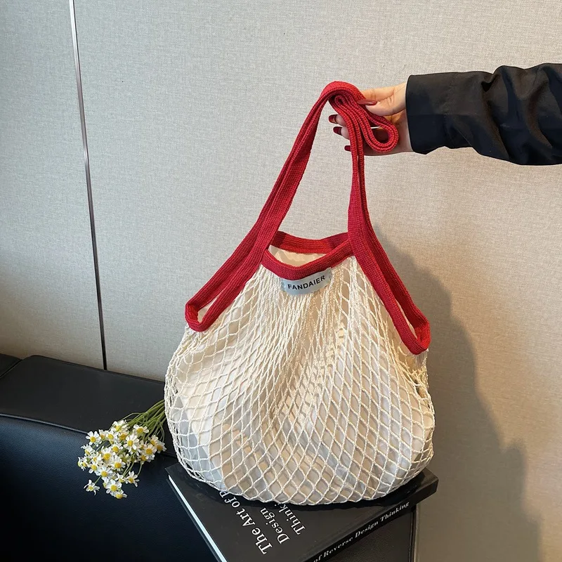 Polyester Hollow Woven Shoulder Bag Korean Style Pockets Mesh Handbags Large Capacity Edge Covering Summer Beach Tote Bags
Polyester Hollow Woven Shoulder Bag Korean Style Pockets Mesh Handbags Large Capacity Edge Covering Summer Beach Tote Bags