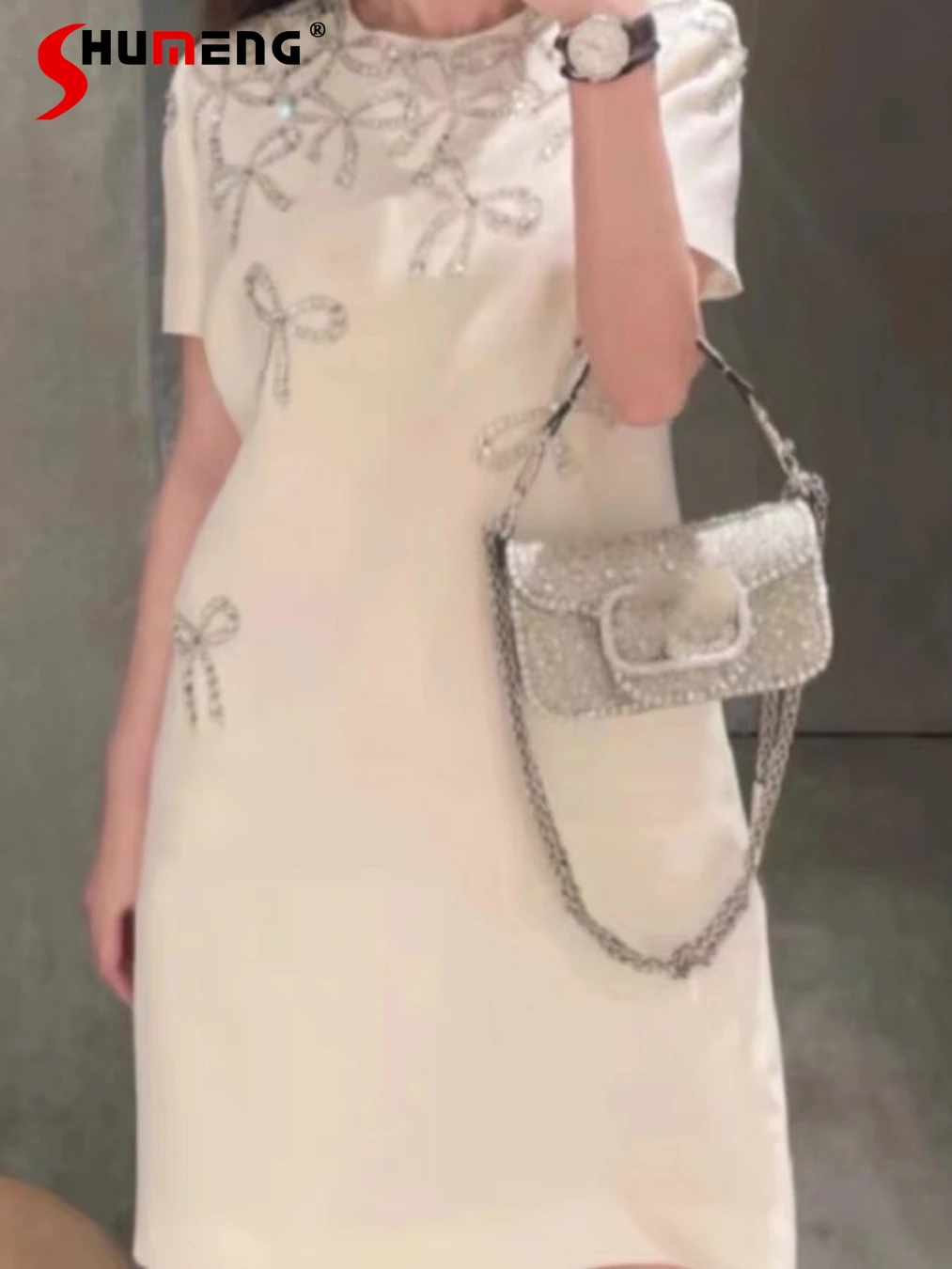 2024 Early Spring New Dress Fashion Socialite Three-Dimensional Bow Crystal Beaded Short Sleeve Round Neck Elegant Dresses
2024 Early Spring New Dress Fashion Socialite Three-Dimensional Bow Crystal Beaded Short Sleeve Round Neck Elegant Dresses