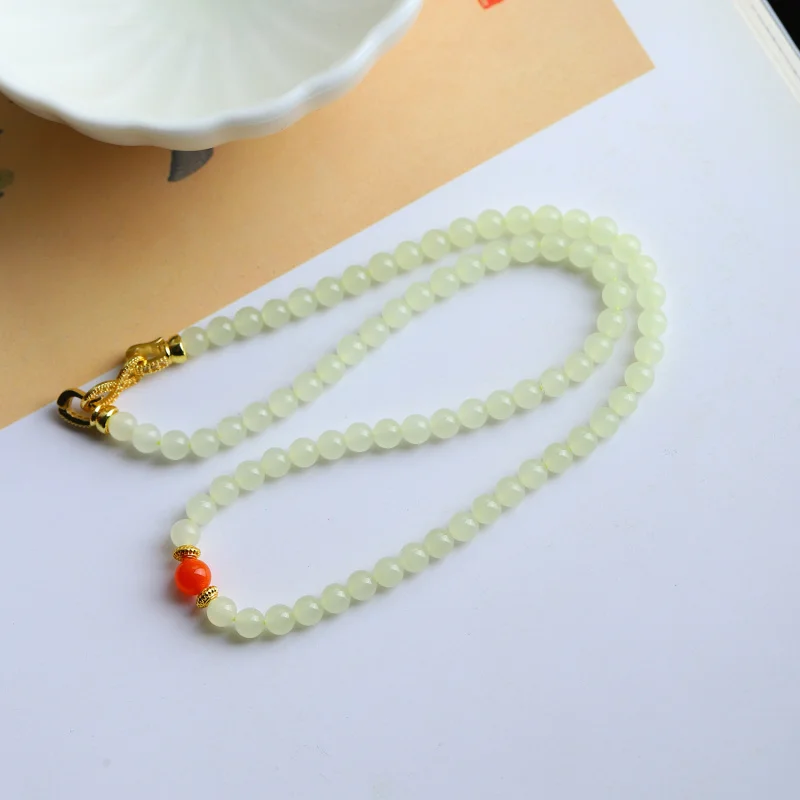 Hetian necklace , natural Qinghai material, vintage yellow bead chain, versatile jade accessory
Hetian necklace , natural Qinghai material, vintage yellow bead chain, versatile jade accessory