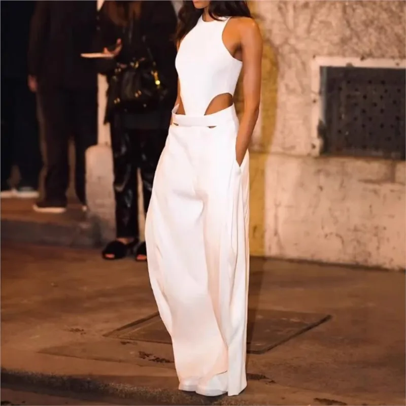 2025 Elegant White Jumpsuit Round Neck Sleeveless Hollow Irregular Slim High Waist Wide Leg Rompers High Street Women's Clothing
2025 Elegant White Jumpsuit Round Neck Sleeveless Hollow Irregular Slim High Waist Wide Leg Rompers High Street Women's Clothing