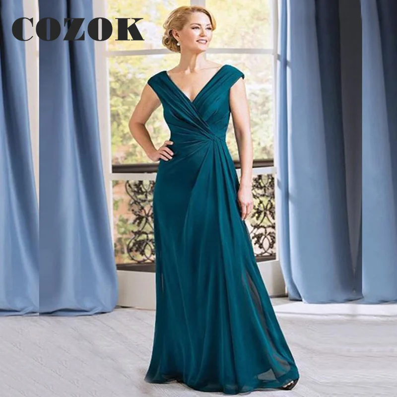 Simple Elegant Green Mother Of The Bride Dresses V Neck Wedding Party Gowns Sleeveless Vestidos De Fiesta Custom LF33
Simple Elegant Green Mother Of The Bride Dresses V Neck Wedding Party Gowns Sleeveless Vestidos De Fiesta Custom LF33