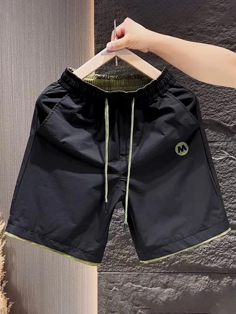 Мужские летние повседневные шорты Qui Dry, новая корейская мода, свободные прямые шорты-труба для пляжа, дышащие и удобные.
Мужские летние повседневные шорты Qui Dry, новая корейская мода, свободные прямые шорты-труба для пляжа, дышащие и удобные.