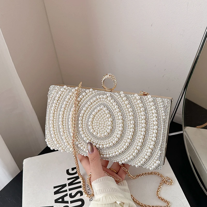 Вечерний клатч в дизайнерском стиле Роскошная сумка через плечо с жемчугом и стразами, элегантная сумка через плечо, свадебное платье, банкетная сумка
Вечерний клатч в дизайнерском стиле Роскошная сумка через плечо с жемчугом и стразами, элегантная сумка через плечо, свадебное платье, банкетная сумка