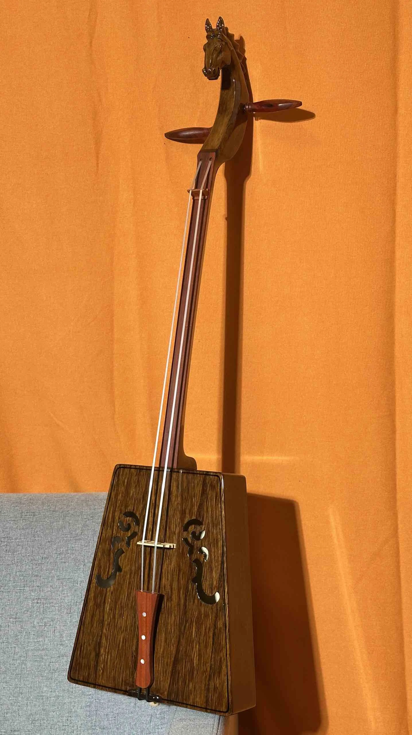 Morin Khuur Matouqin Paulownia panel Maduro Inner Mongolia string instruments
Morin Khuur Matouqin Paulownia panel Maduro Inner Mongolia string instruments