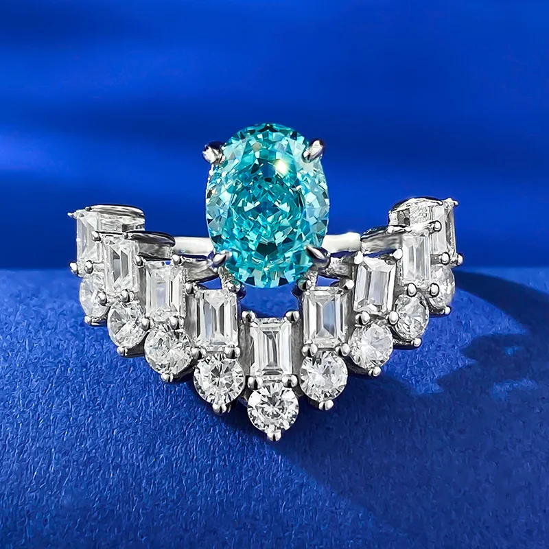 BELLUX New High Carbon Diamond Ring Full Body 925 silver Inlaid 6 * 8 Paraiba Oval Sapphire Shining Ring
BELLUX New High Carbon Diamond Ring Full Body 925 silver Inlaid 6 * 8 Paraiba Oval Sapphire Shining Ring