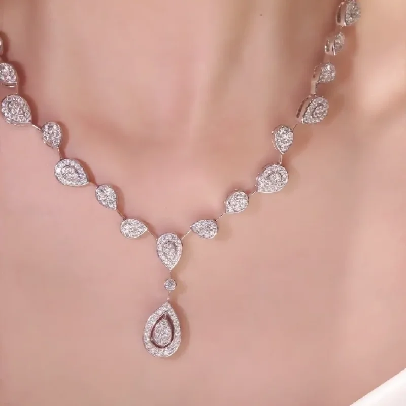 Роскошное колье Cameo с белыми цирконами в форме капли, серебро 925 пробы, с бриллиантами, для женщин, элегантное украшение для свадьбы и вечеринок
Роскошное колье Cameo с белыми цирконами в форме капли, серебро 925 пробы, с бриллиантами, для женщин, элегантное украшение для свадьбы и вечеринок