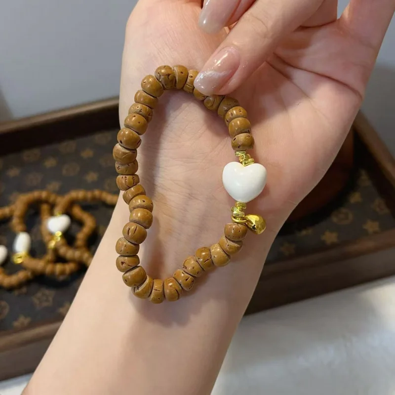 Peach Pit Garlic Clove Large Intestine Single Loop Bracelet With Bone Heart High Aesthetic Value
Peach Pit Garlic Clove Large Intestine Single Loop Bracelet With Bone Heart High Aesthetic Value