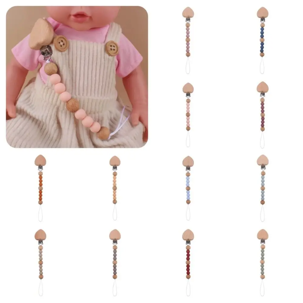 Dummy Clips Pacifier Holder Clips Wood Soother Holder Baby Pacifier Chain Love Nipple Holder Clips Baby Teether Toys Straps
Dummy Clips Pacifier Holder Clips Wood Soother Holder Baby Pacifier Chain Love Nipple Holder Clips Baby Teether Toys Straps