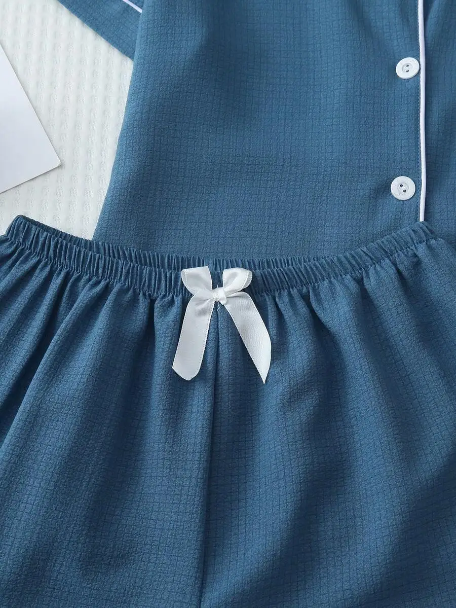 Womens Solid Color Summer Sleepwear Set With Contrast Trim Button-Up Top And Bowknot Shorts
Womens Solid Color Summer Sleepwear Set With Contrast Trim Button-Up Top And Bowknot Shorts