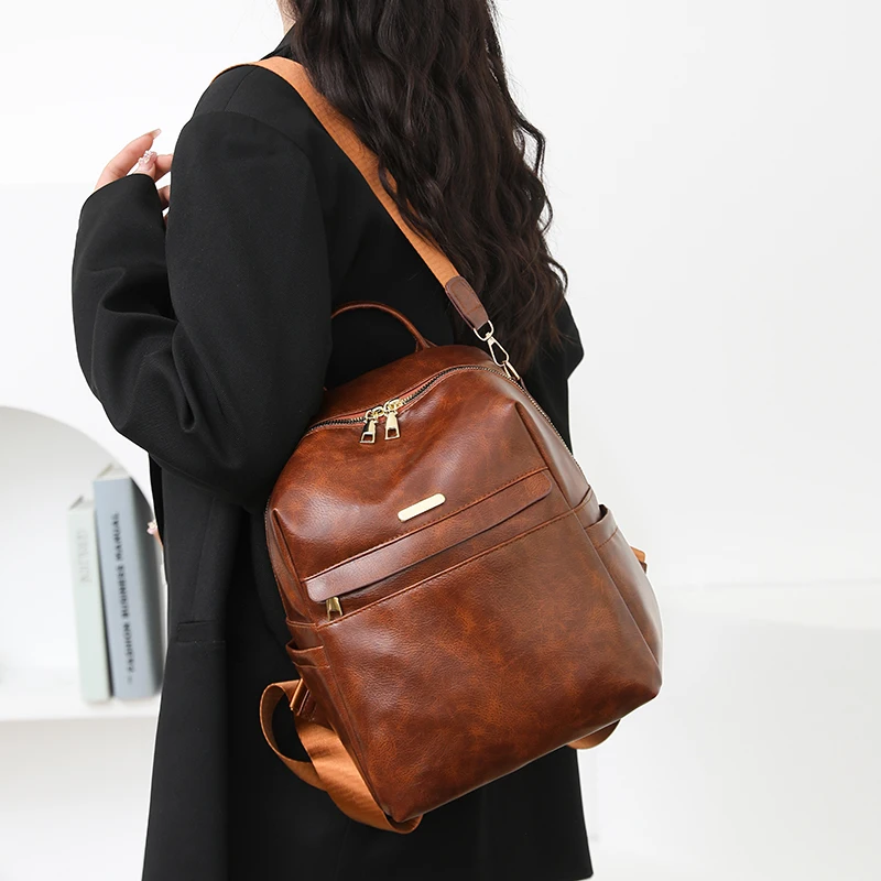 Женский модный рюкзак из искусственной кожи, большая вместительная дорожная сумка, рюкзак для ноутбука, школьная сумка на плечо для колледжа с карманами на молнии
Женский модный рюкзак из искусственной кожи, большая вместительная дорожная сумка, рюкзак для ноутбука, школьная сумка на плечо для колледжа с карманами на молнии