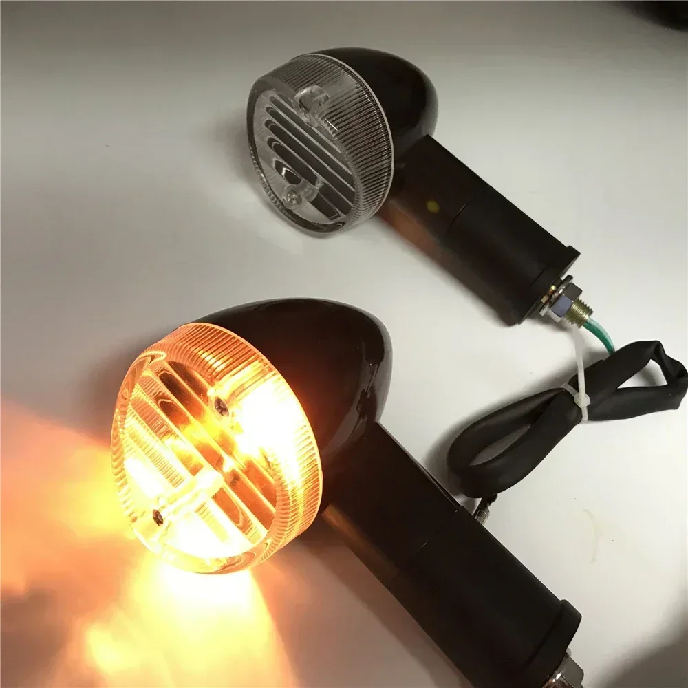 Мотоциклетные левые и правые универсальные указатели поворота для Harley Davidson, янтарный мигающий световой индикатор с черепом
Мотоциклетные левые и правые универсальные указатели поворота для Harley Davidson, янтарный мигающий световой индикатор с черепом