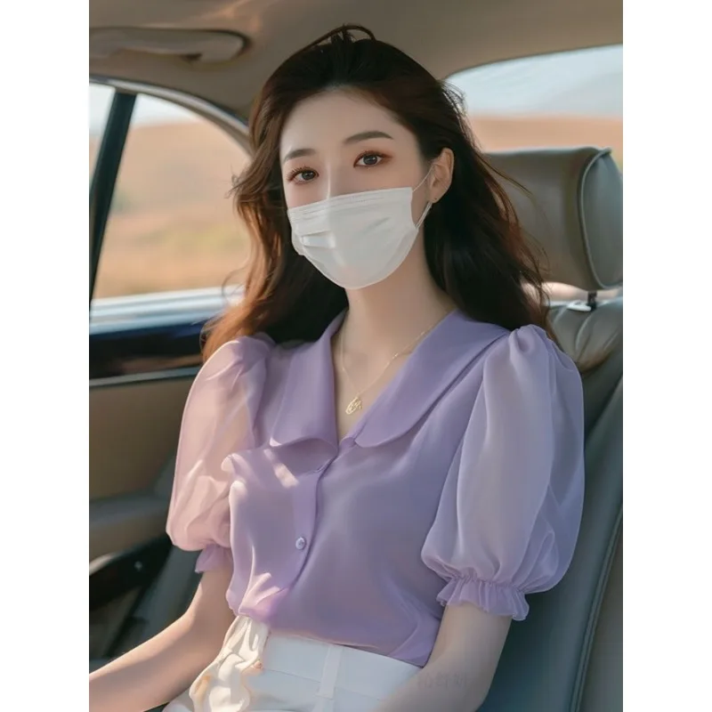 Фиолетовый кукольный воротник, шифоновая женская рубашка с короткими рукавами, новый стиль, французский топ с пышными рукавами
Фиолетовый кукольный воротник, шифоновая женская рубашка с короткими рукавами, новый стиль, французский топ с пышными рукавами