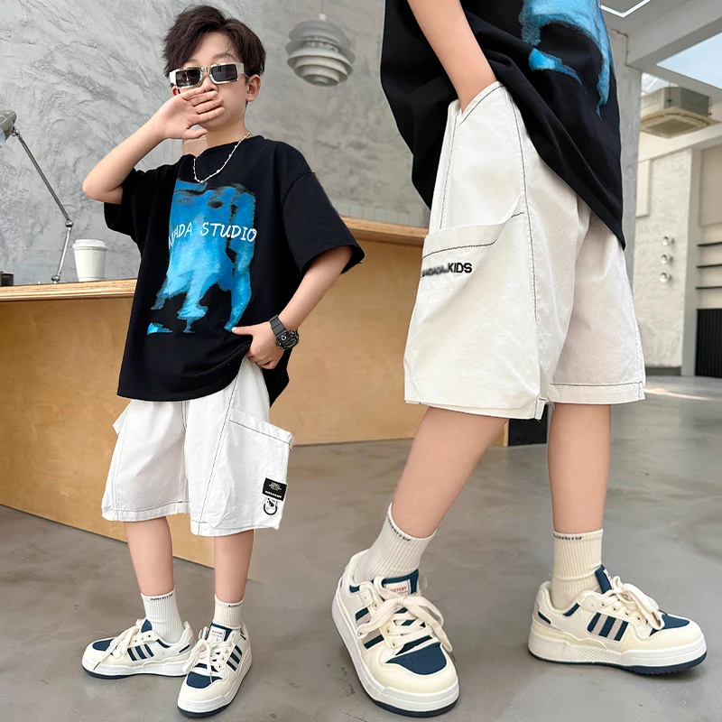 New Summer Children Minimalist Brief Style White Cargo Shorts with Side Pocket for Teens Boy Loose Casual Knee Length Pants 5-14
New Summer Children Minimalist Brief Style White Cargo Shorts with Side Pocket for Teens Boy Loose Casual Knee Length Pants 5-14