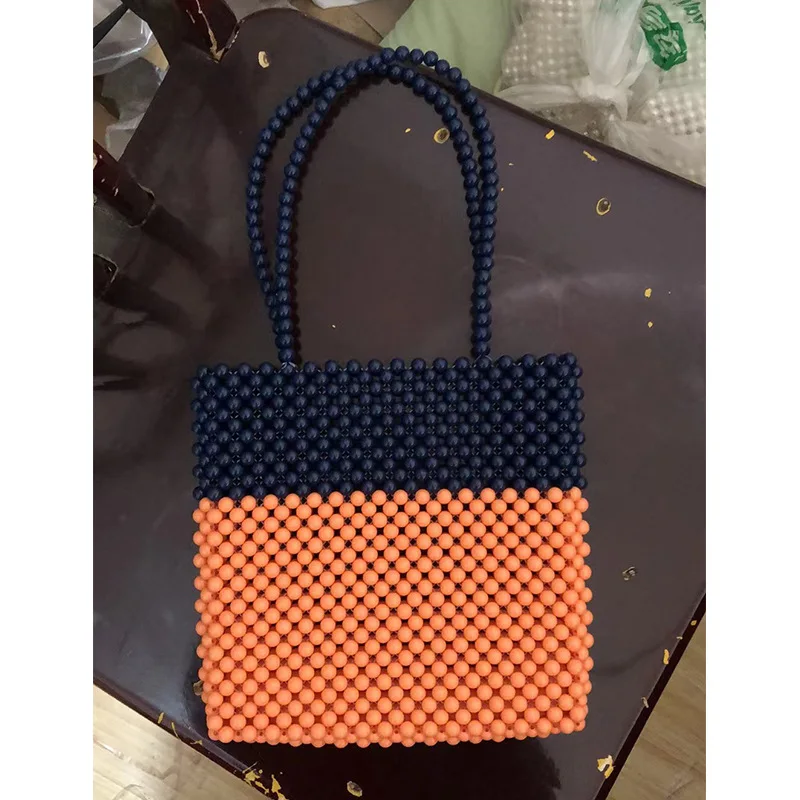 Customized Handmade Woven Beaded Bag New Minimalist Black Orange Patchwork Women's Shoulder Bags Niche Design Large Handbag
Customized Handmade Woven Beaded Bag New Minimalist Black Orange Patchwork Women's Shoulder Bags Niche Design Large Handbag
