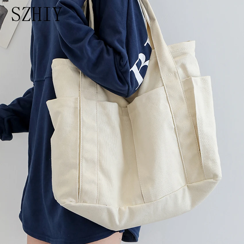 Multi Pocket Shoulder Bag Women Canvas Pocket Travel Storage Bag Big School Multifunctional Mommy Shopping Tote Designer Handbag
Multi Pocket Shoulder Bag Women Canvas Pocket Travel Storage Bag Big School Multifunctional Mommy Shopping Tote Designer Handbag