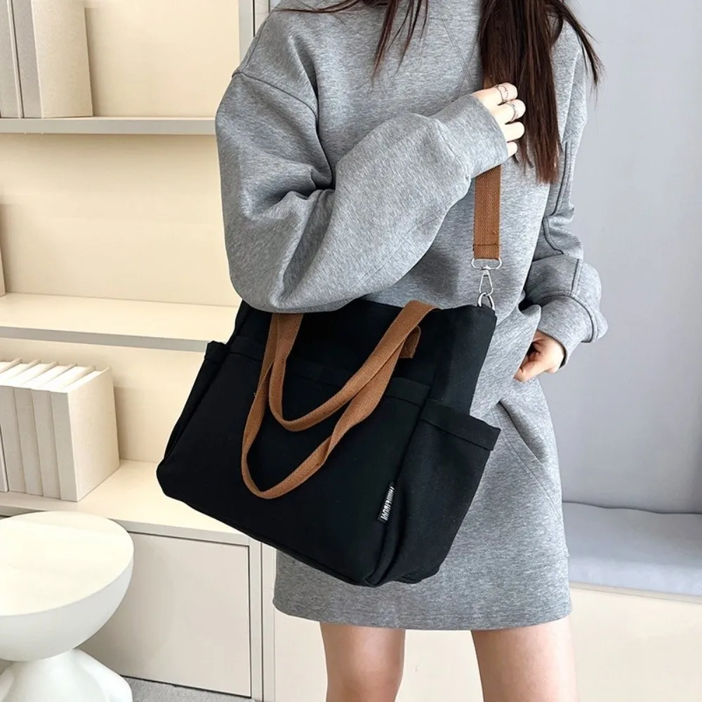 Thickened Canvas Handbag Zipper Multi-Pocket Large Capacity Tote Bag Single Shoulder Solid Color Commuting Crossbody Bag Student
Thickened Canvas Handbag Zipper Multi-Pocket Large Capacity Tote Bag Single Shoulder Solid Color Commuting Crossbody Bag Student