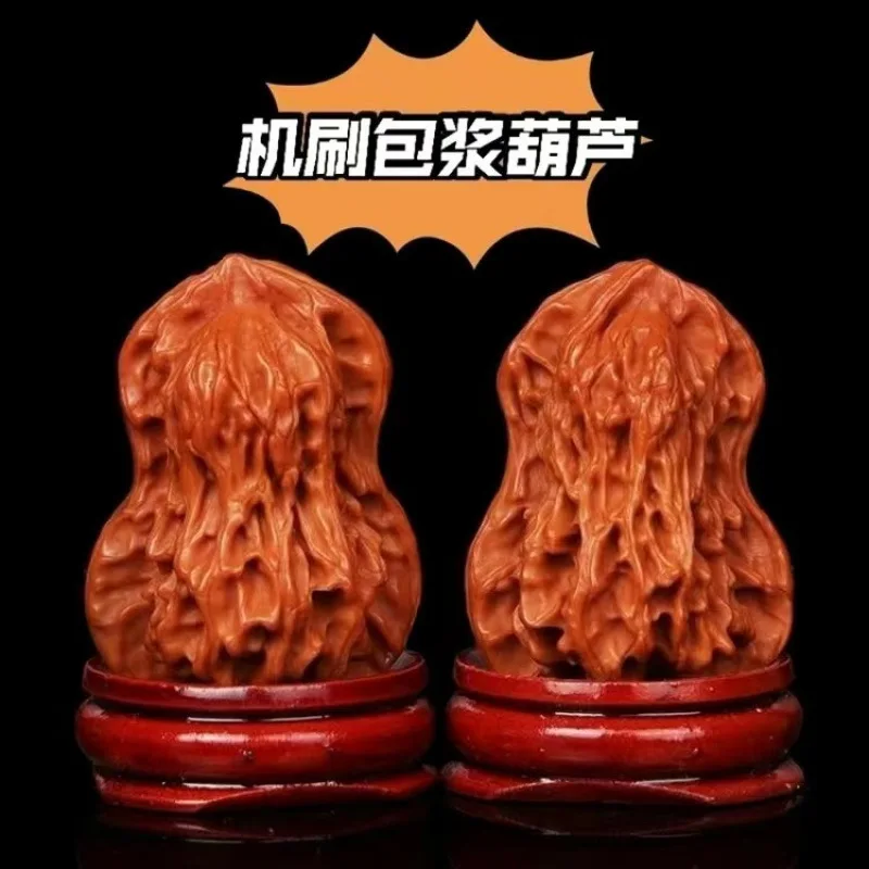 Patinated jadeified paired pieces of walnut gourds with mountain-like patterns, featuring niche designs of Kirin and the
Patinated jadeified paired pieces of walnut gourds with mountain-like patterns, featuring niche designs of Kirin and the
