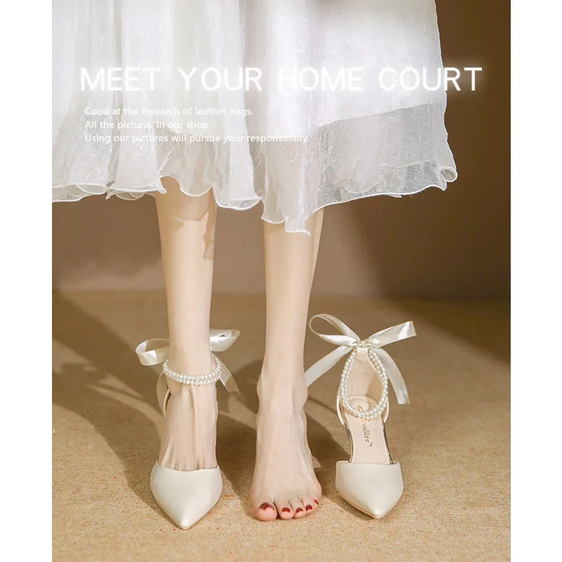 French office women's shoes thin heel pointed high heels one line button hollow sandals pearl bow temperament office shoes 7CM
French office women's shoes thin heel pointed high heels one line button hollow sandals pearl bow temperament office shoes 7CM