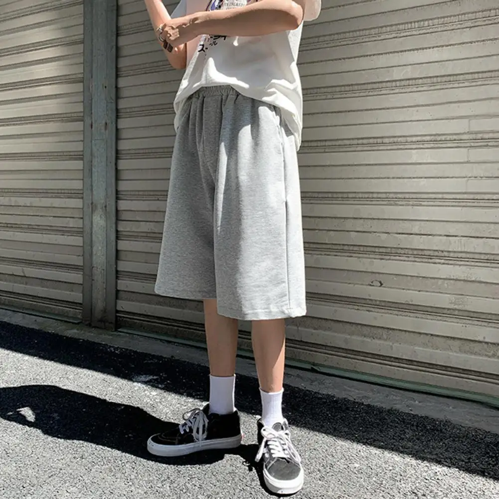Men Sport Pants Men's Breathable Drawstring Gym Shorts for Training Jogging Loose Fit Solid Color Sweatpants with Elastic Waist
Men Sport Pants Men's Breathable Drawstring Gym Shorts for Training Jogging Loose Fit Solid Color Sweatpants with Elastic Waist
