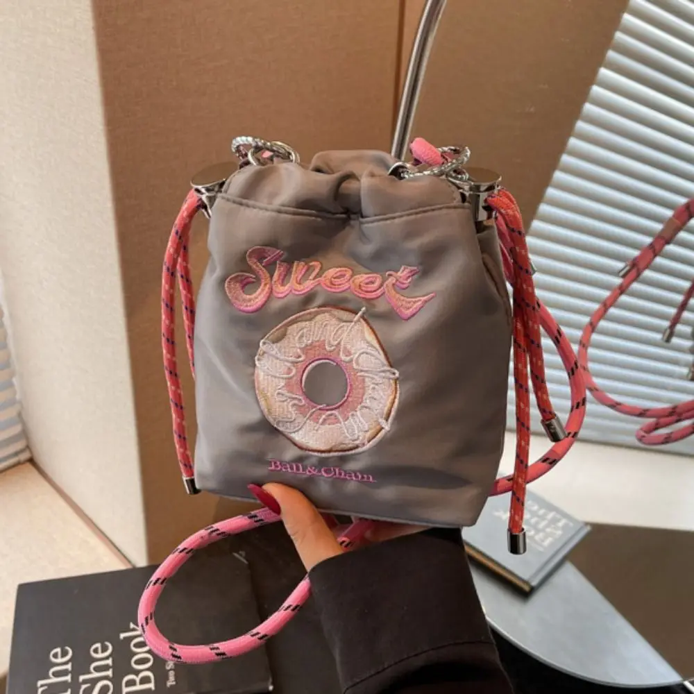 Sweet Drawstring Bucket Bag Embroidery Design Doughnut Pattern Embroidered Shoulder Bag Shoulder Strap Cute Pattern
Sweet Drawstring Bucket Bag Embroidery Design Doughnut Pattern Embroidered Shoulder Bag Shoulder Strap Cute Pattern