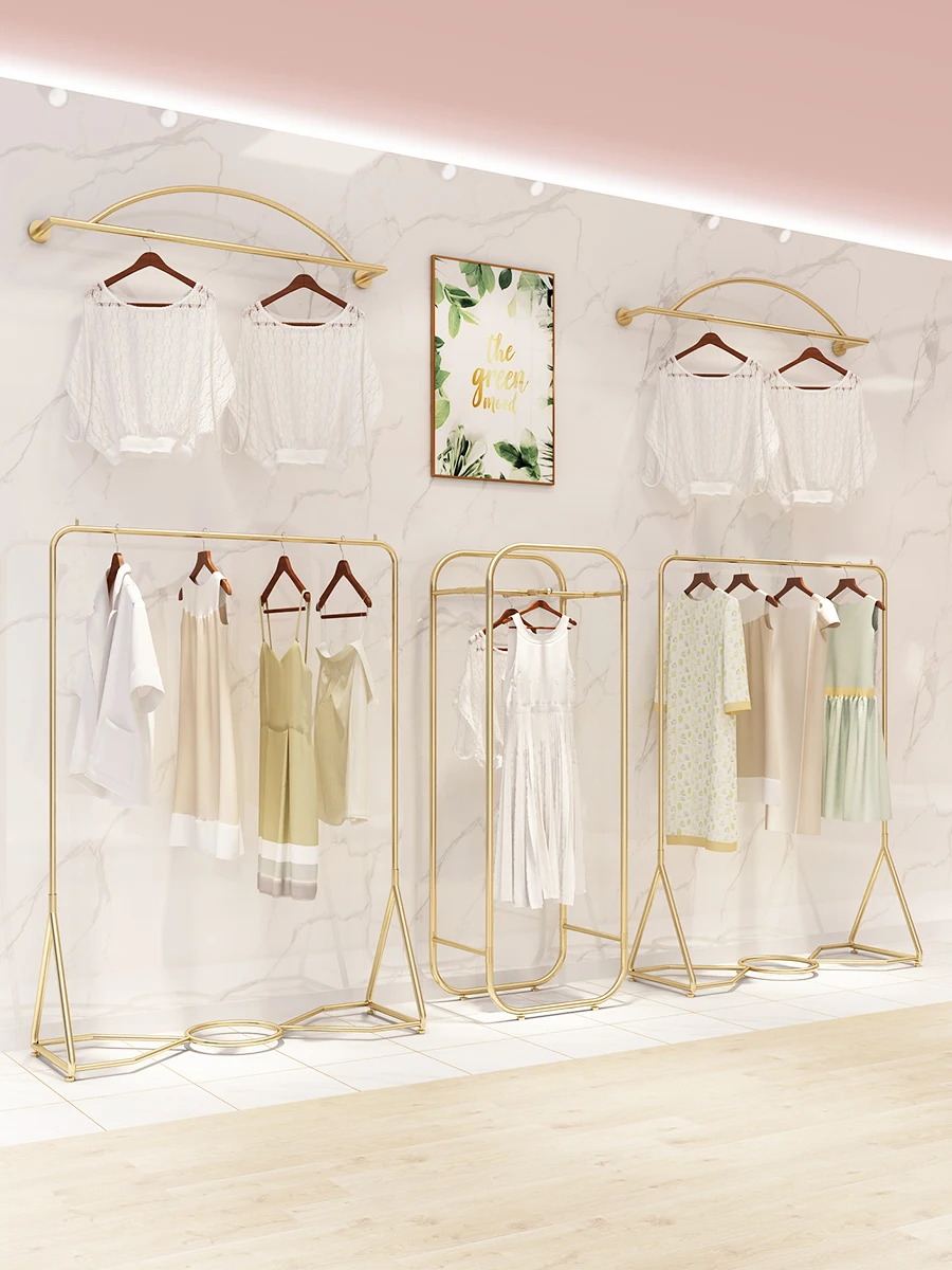 Clothing store display rack floor-standing light luxury women's clothing store display shelves golden clothes shelves
Clothing store display rack floor-standing light luxury women's clothing store display shelves golden clothes shelves