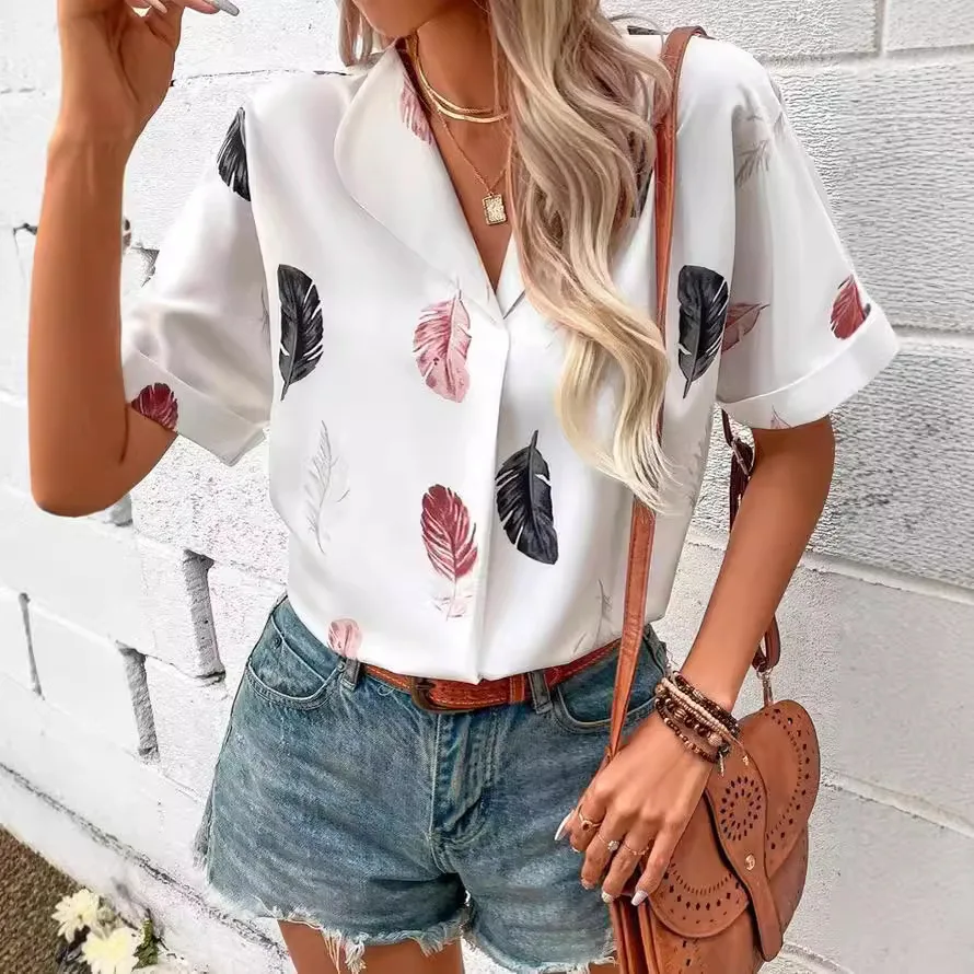 2025 summer new European and American women's clothing lapel feather print short-sleeved top shirt
2025 summer new European and American women's clothing lapel feather print short-sleeved top shirt