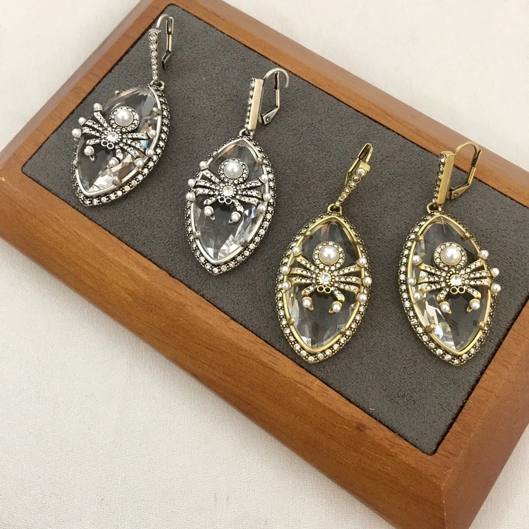 New Spider Water Drop Earrings for Women with High End Personality and Retro Transparent Rhinestone Punk Skull Ear Buckle
New Spider Water Drop Earrings for Women with High End Personality and Retro Transparent Rhinestone Punk Skull Ear Buckle